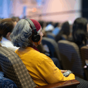 Woman with headphones on.